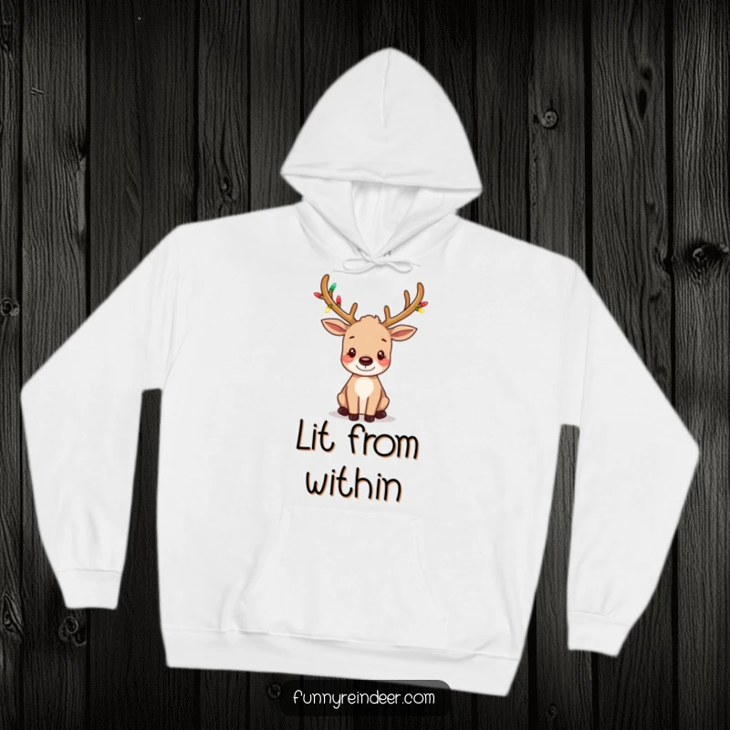 Funny hoodie adorned with a charming reindeer whose tiny antlers are wrapped in festive lights, and its ears are in a playful wiggle.