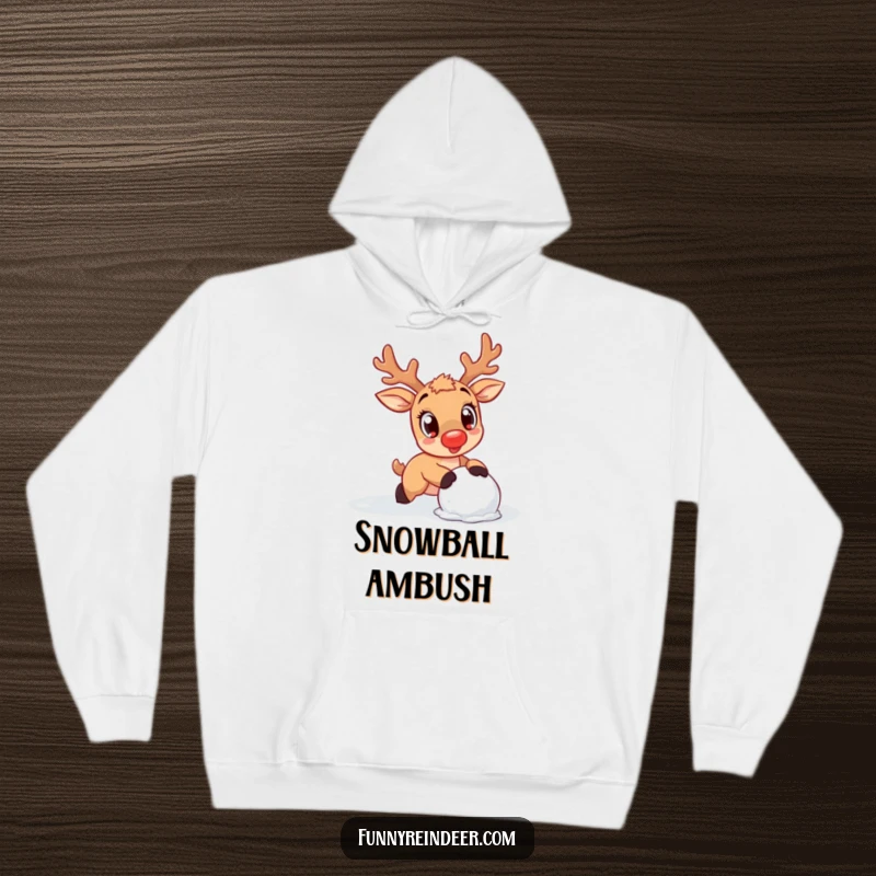 Funny Reindeer Hoodie: A kawaii reindeer with wide eyes trips over a snowball, offering comfort and cute humor.