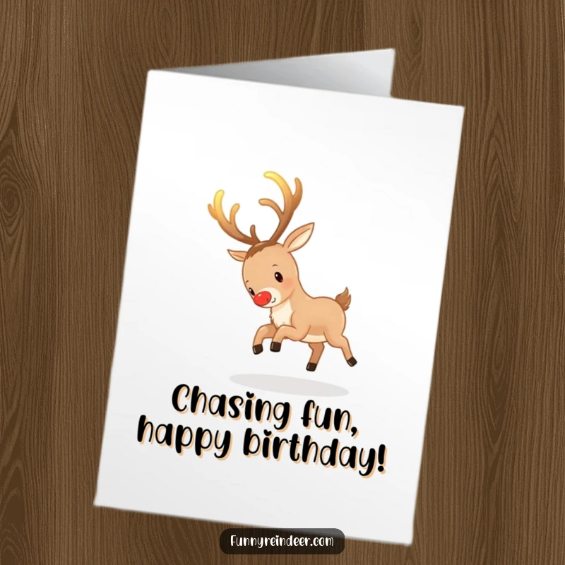 Funny Free Printable Birthday Card: Reindeer playfully chasing its own glowing antlers