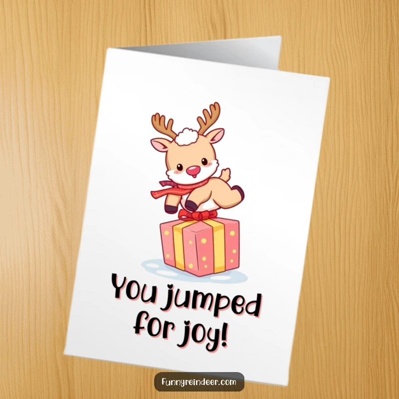 Funny Free Printable Congratulations Card: Reindeer joyfully jumping over a bright gift