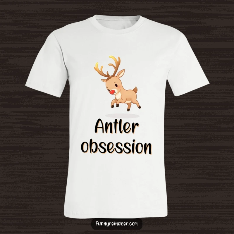 Funny Reindeer T-Shirt: A reindeer playfully chases its own glowing antlers, perfect for whimsical fun.