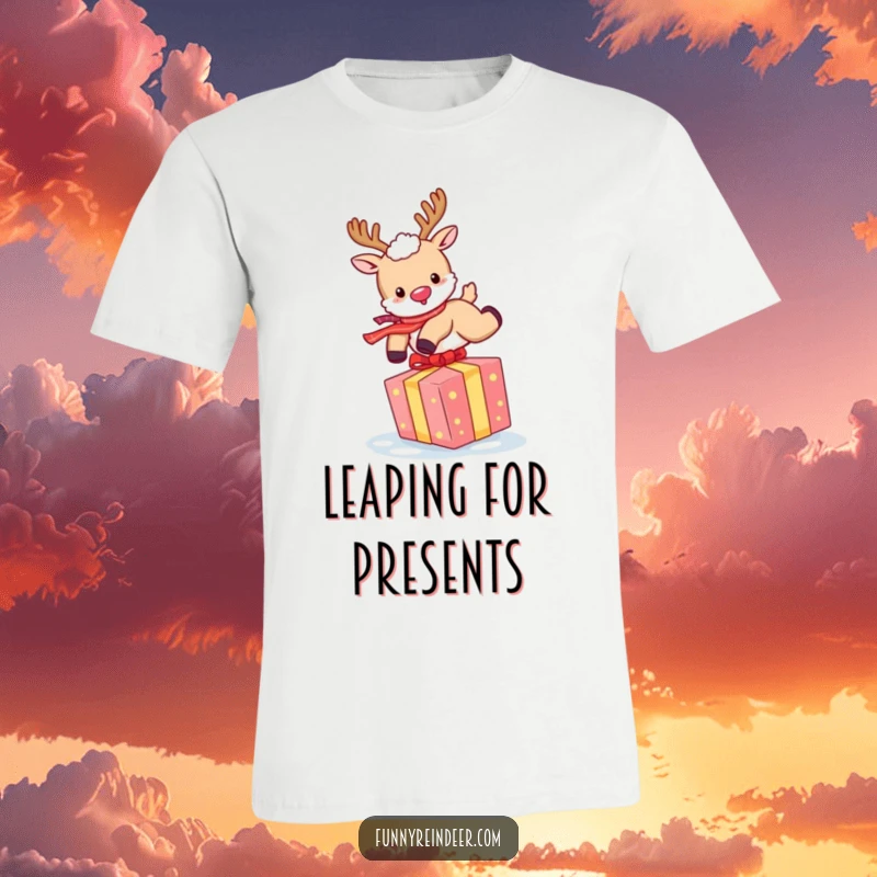 Funny Reindeer T-Shirt: A fluffy reindeer leaps over a colorful gift with pure joy, perfect for holiday fun.