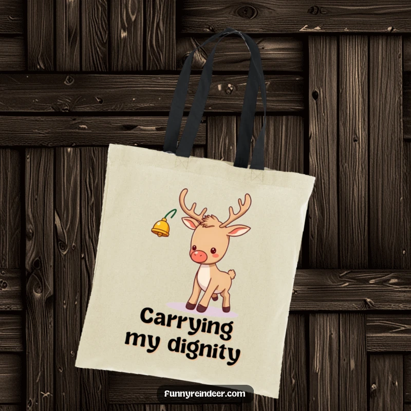 Funny tote bag featuring a clumsy reindeer with a bell on its antler, hilariously tripping during a festive Christmas moment, great for shopping.